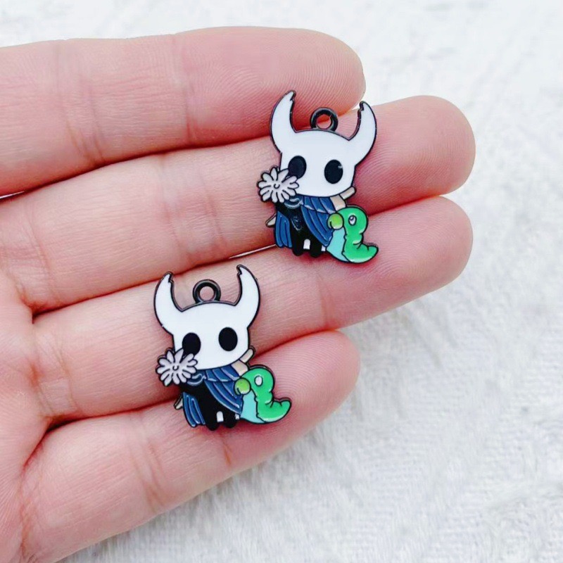 10 個合金ドリップオイル漫画アクセサリーペンダント DIY - Drop Earrings のレビューと価格