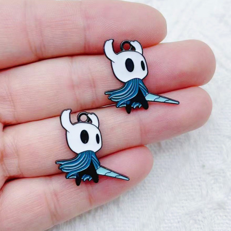 10 個合金ドリップオイル漫画アクセサリーペンダント DIY - Drop Earrings のレビューと価格